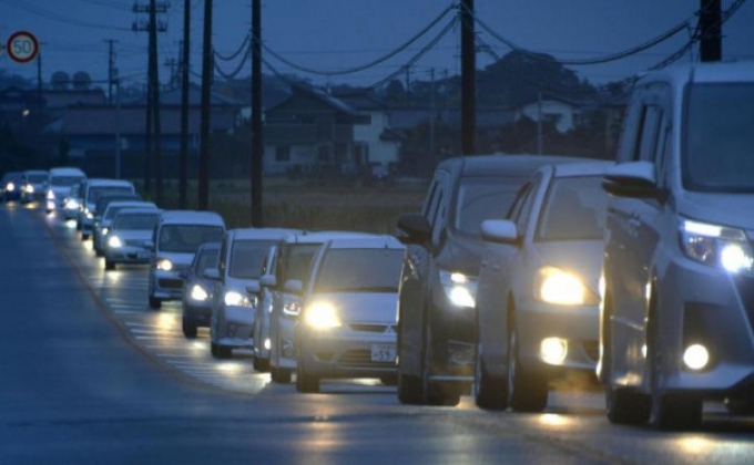 Tsunami hits Japan after strong quake, nuke plant briefly disrupted