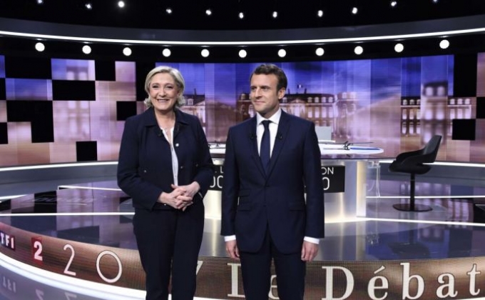 Macron ahead in polls after heated Le Pen debate