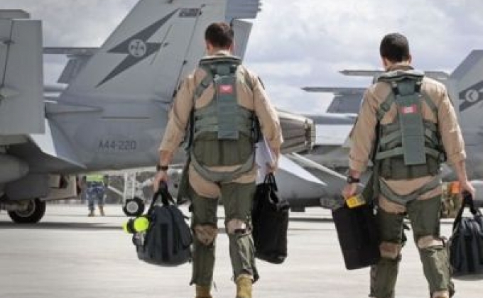 Australia suspends air strikes in Syria due to Russia's decision