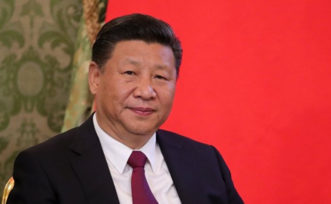 China's parliament re-elects Xi Jinping as president