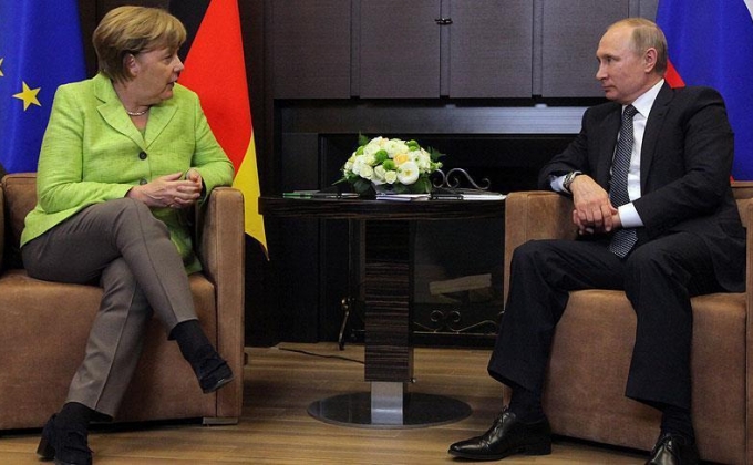 Путин и Меркель обсудили Сирию и Украину
