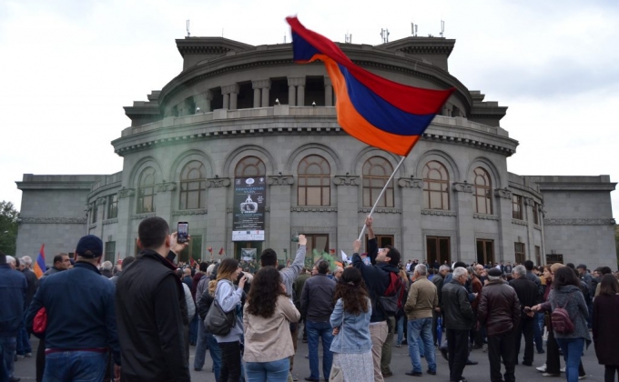 Opposition protesters block Baghramyan Avenue in Yerevan, police form human chain