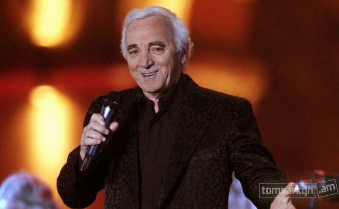 Aznavour returns to France, no health concerns