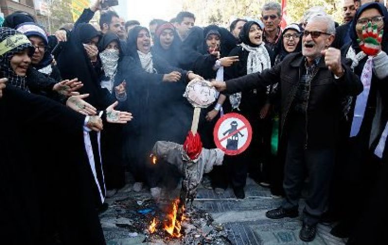 Protests erupt in Iran as US sanctions strike