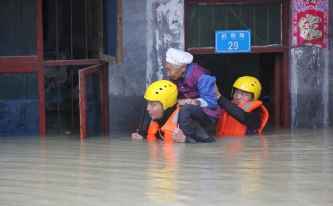 Floods in China kill almost 130, wipe out crops