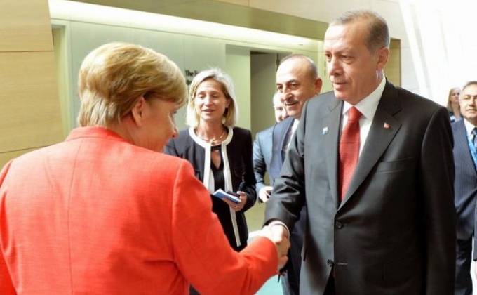 Merkel urges Erdogan to release German journalist arrested in Turkey