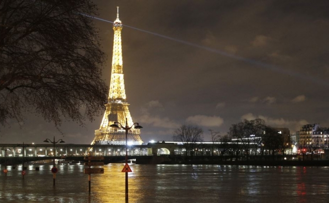 France's Eiffel Tower lights up for women's rights