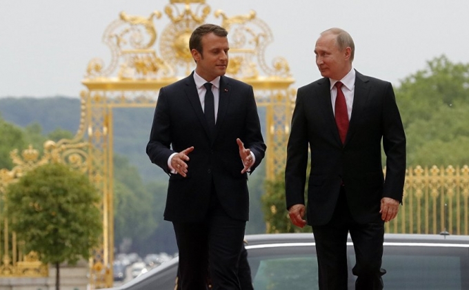 Putin discusses Iran’s nuclear deal with Macron