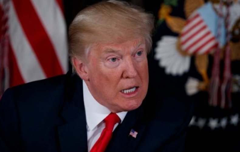 Trump threatens China with new tariffs