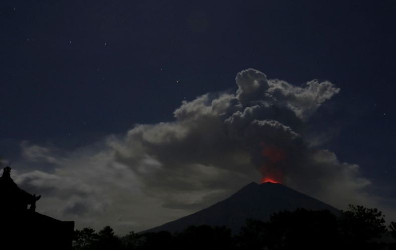 Ash from erupting volcano shuts airport in Indonesia's Bali