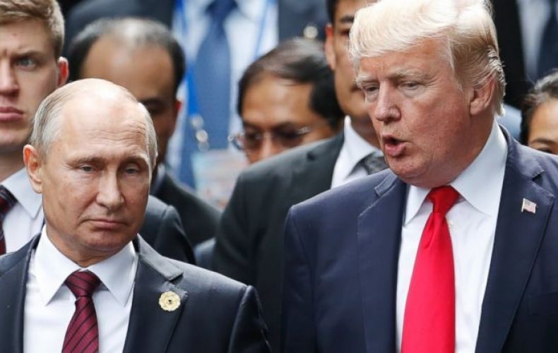 Putin and Trump shake hands as they meet in Helsinki