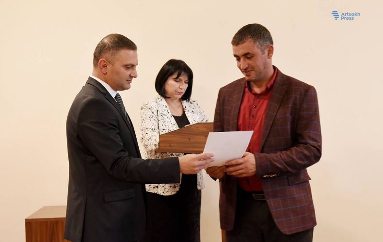 A group of agricultural workers awarded on the occasion of their professional holiday