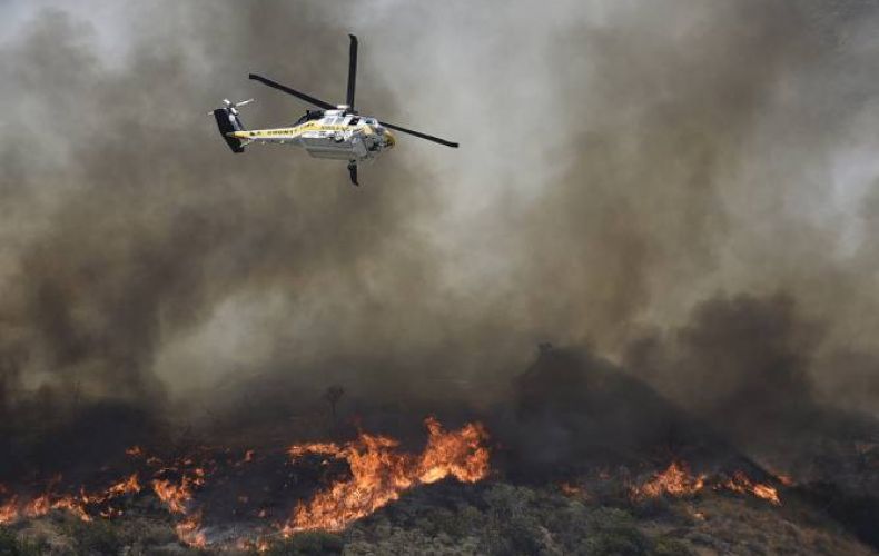 Toll in California wildfire rises to 80