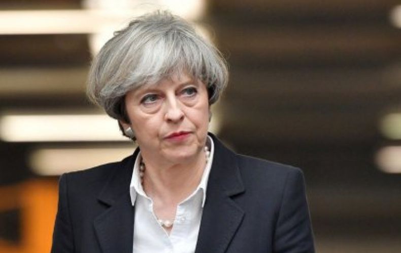 May promises to resign if parliament approves her deal with Brussels
