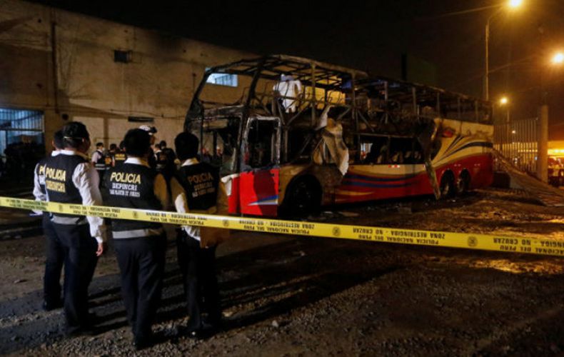 At least 20 killed when fire erupts on bus in Peru