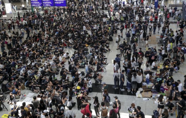 Hong Kong airport occupied in mass sit-in protest