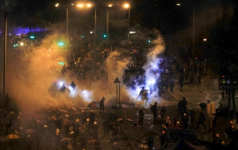 Violence in Hong Kong as Police Fire Tear Gas, Beat Protesters