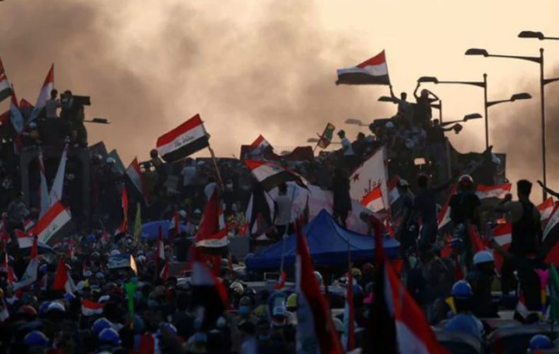 US urges early Iraq polls, end to to violence against protesters
