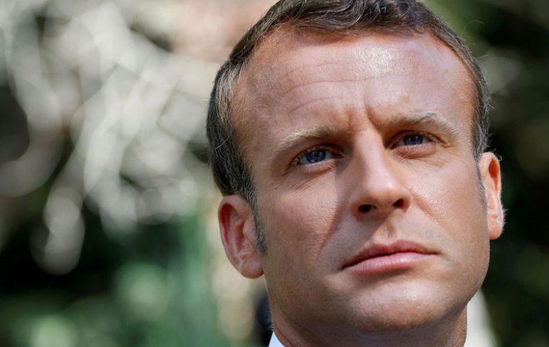 French president Macron evacuated from packed theatre by armed riot police as mob of anti-government protesters try to reach him