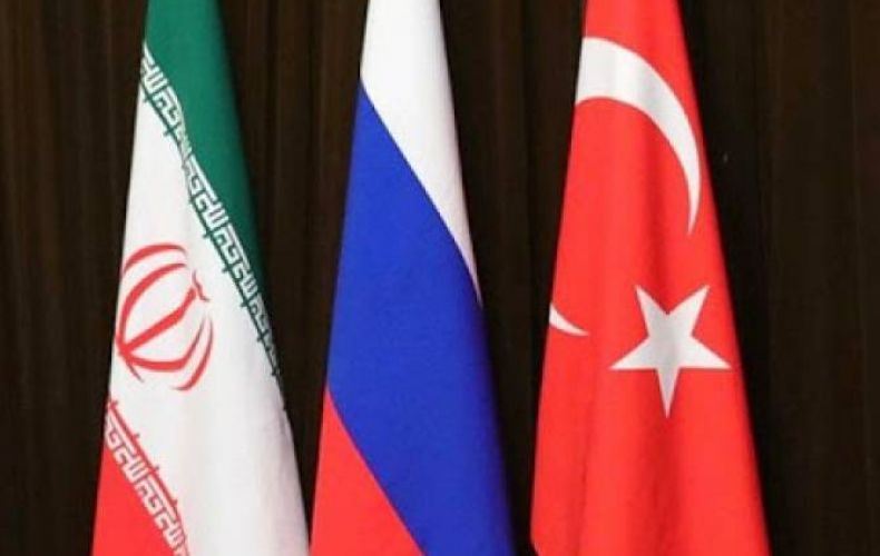 Russia, Turkey and Iran working to agree on date for Syria summit
