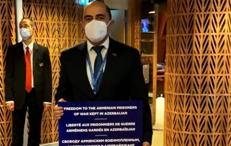 Armenian MP staging protest outside PACE session to raise the issue of Armenian prisoners