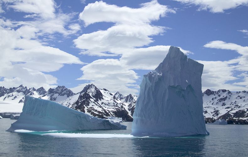 Huge iceberg passes by South Georgia Island