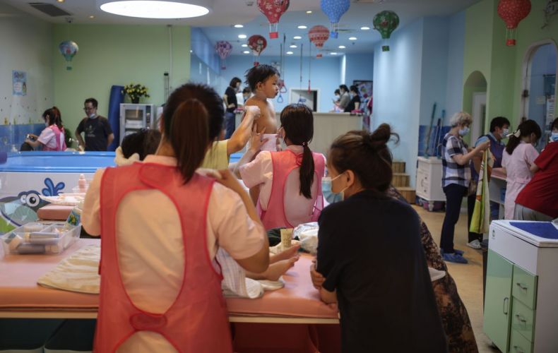 China considering lifting all childbirth restrictions