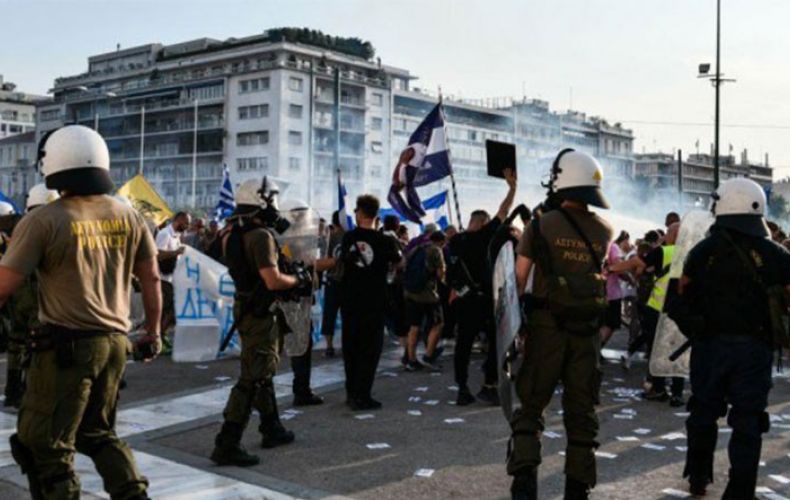 Greek police use tear gas, water canon during Athens protest