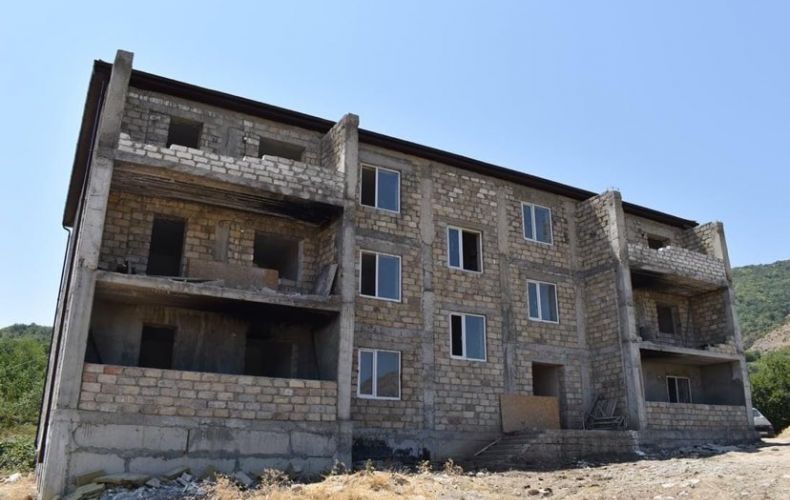 The construction of a three-story residential building in Chartar  being completed